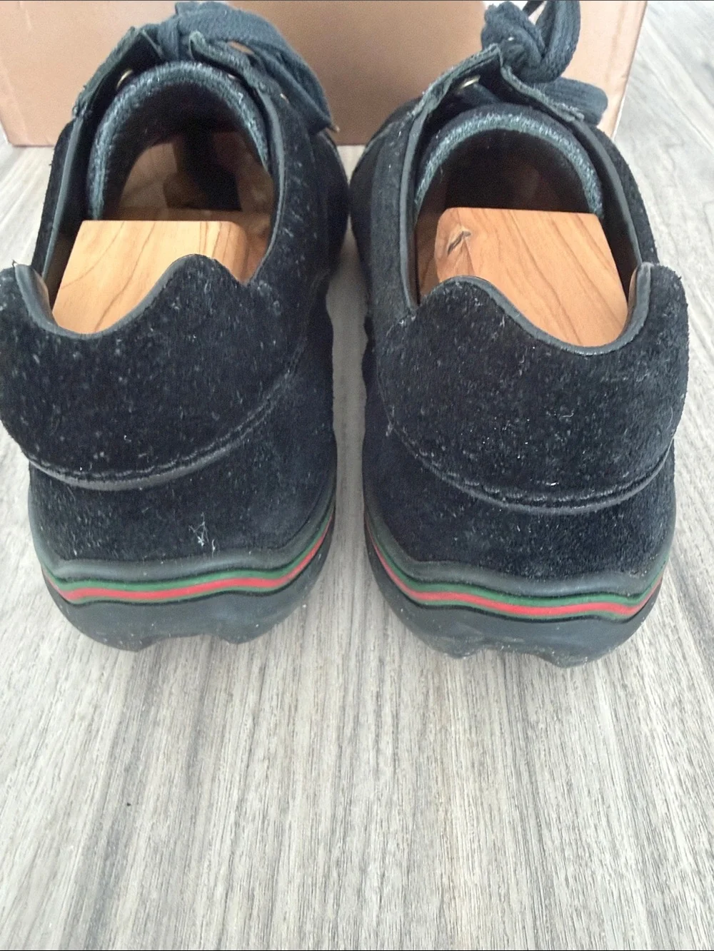 Gucci Men's Black Suede Sneakers with Gold Eyelets